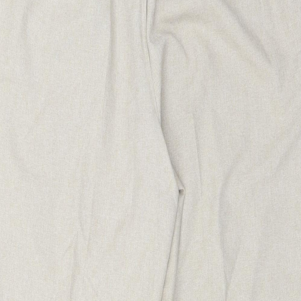 Brand and care label for Bonmarché women’s beige trousers, size UK 18, 26-inch leg