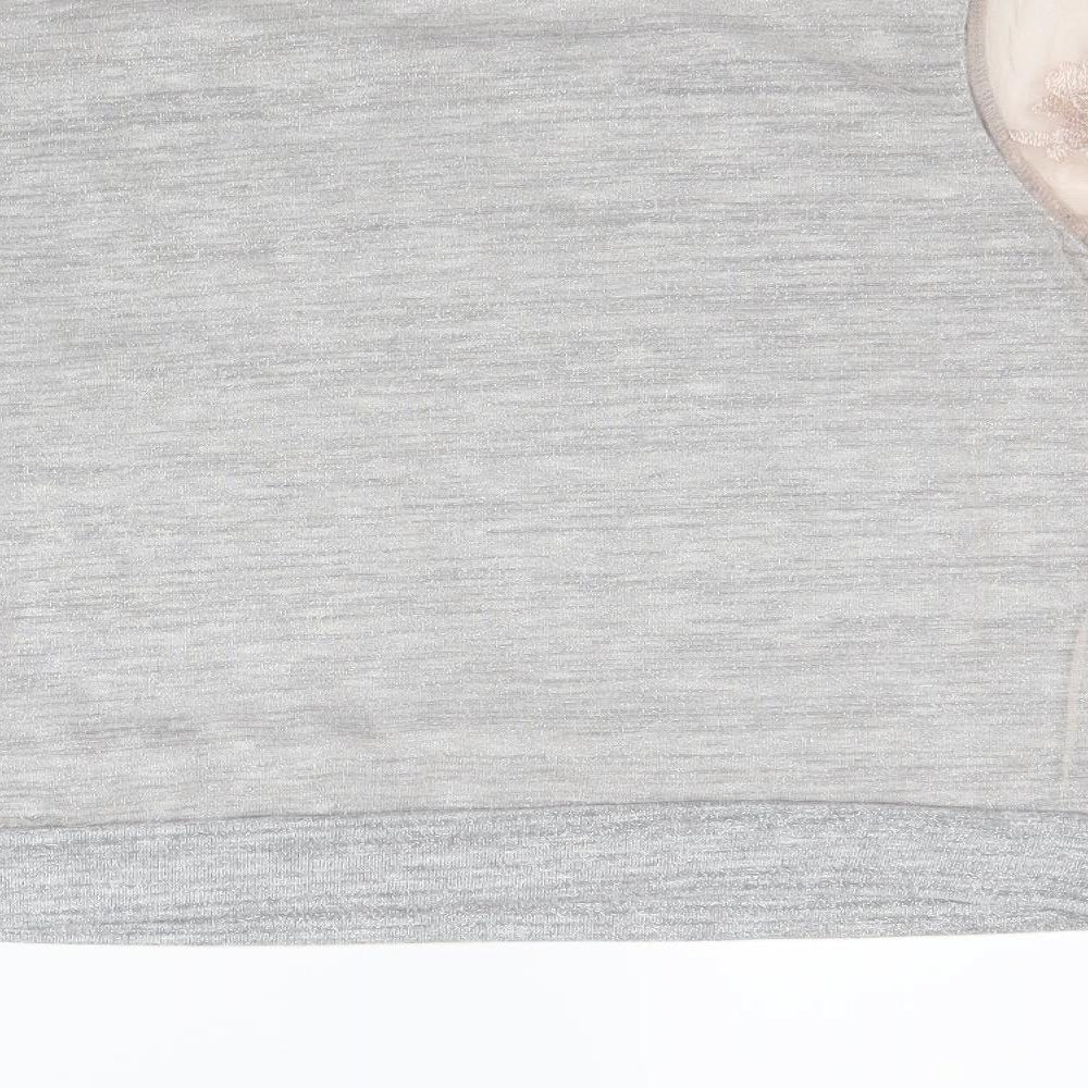 Brand and care label for H&M women’s grey pullover sweatshirt, size M