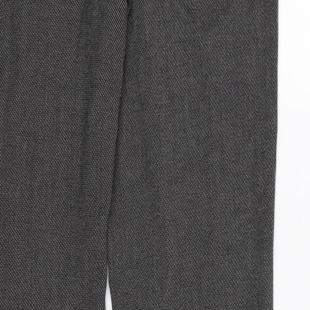 Brand and care label for NAF NAF women’s grey trousers, size UK 32, in, 32-inch leg
