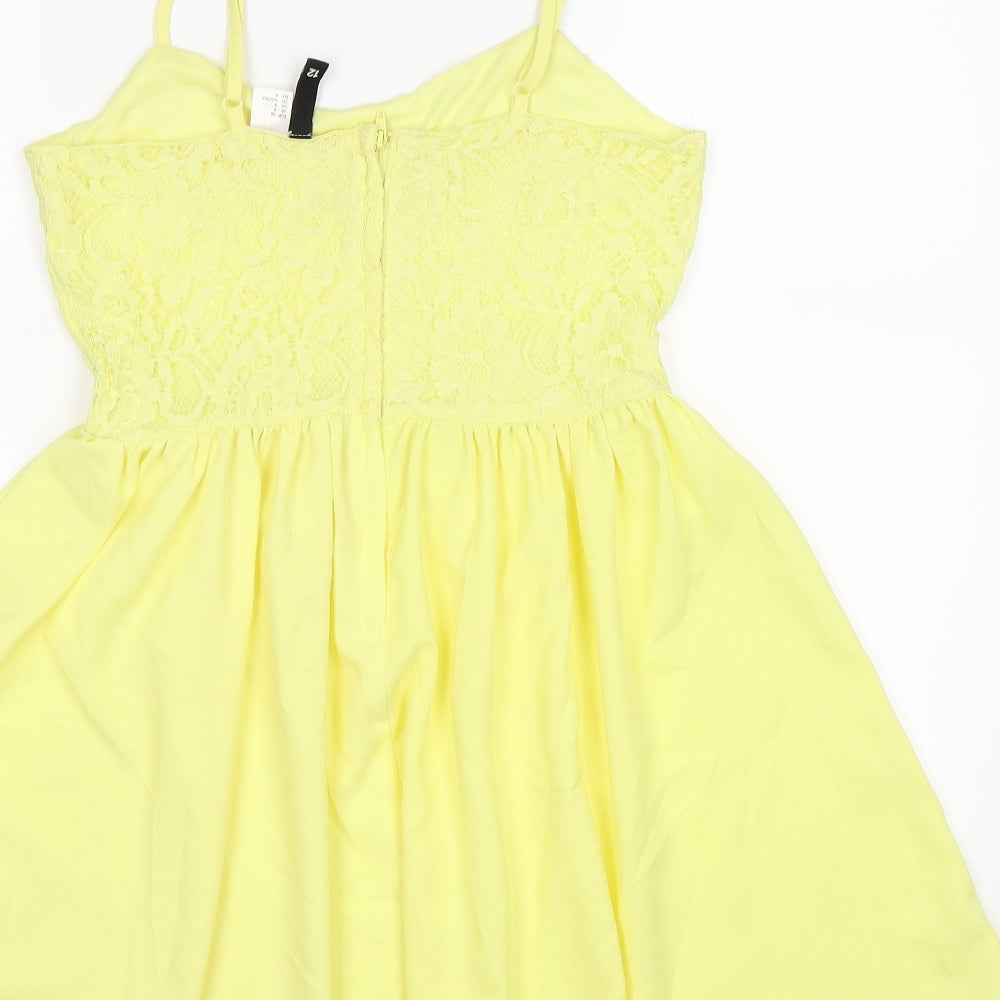 Brand and care label for Divided women’s yellow floral tunic tank, size UK 12