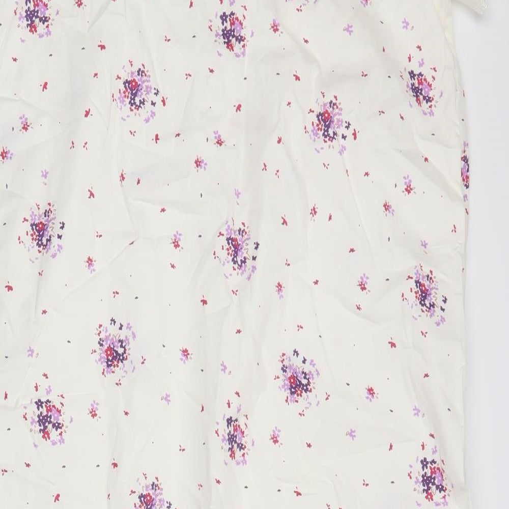 Brand and care label for Bonmarché women’s white floral a-line, size S