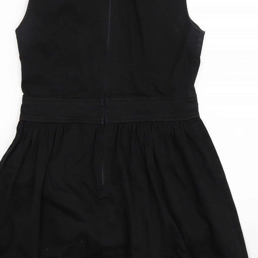 Brand and care label for GLASSONS women’s black fit & flare, size UK 10