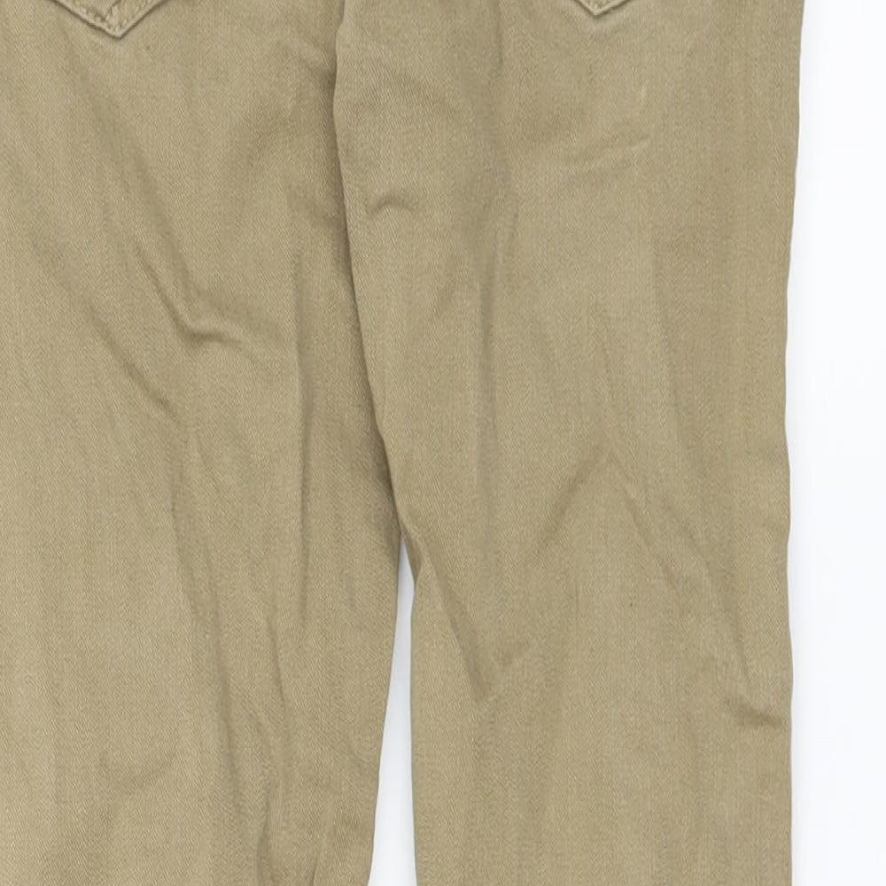 Brand and care label for Next girls’ brown straight jeans, size 8, years
