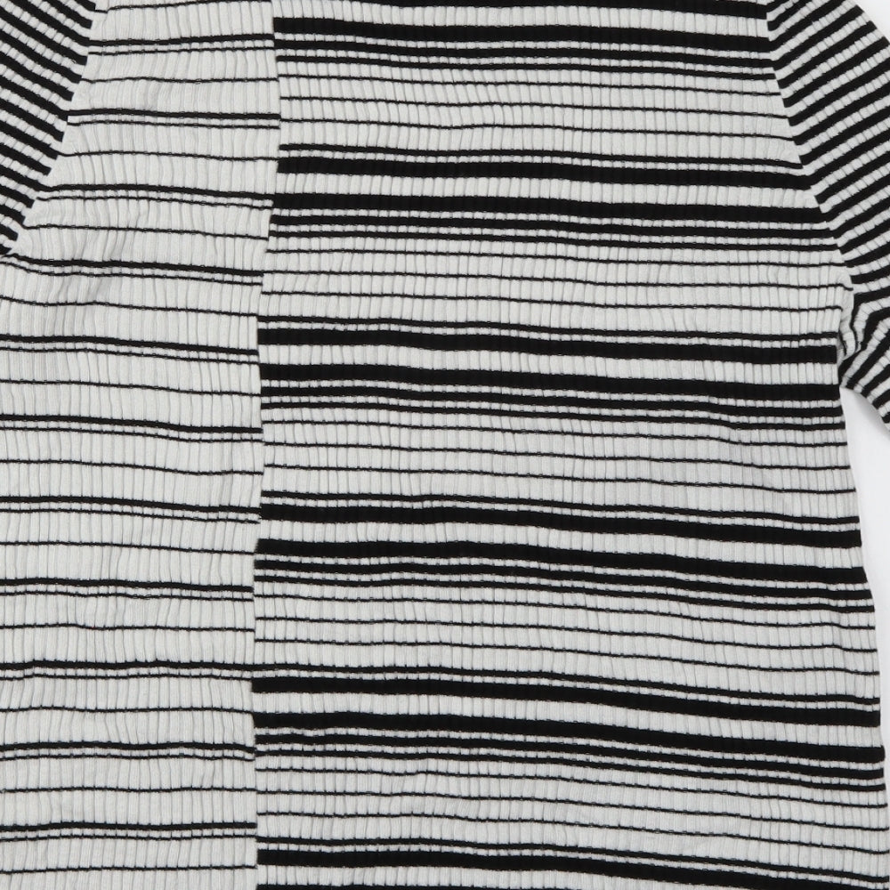 Brand and care label for Per Una women’s multicoloured striped knit jumper, size UK 20