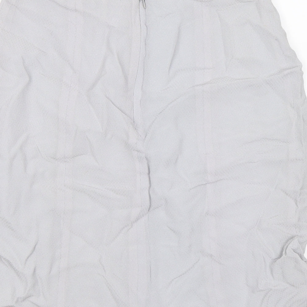 Brand and care label for Preworn women’s grey chiffon flare skirt, size UK 12