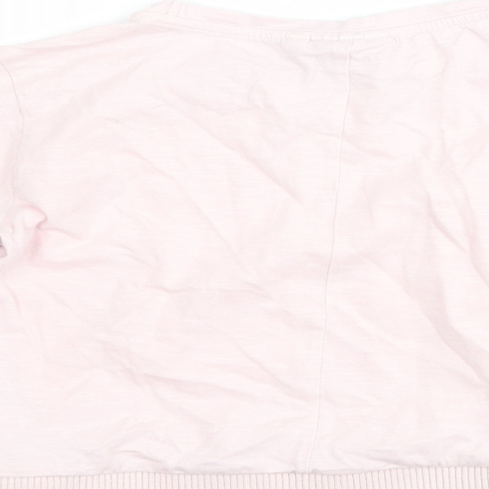 Brand and care label for Next girls’ pink basic t-shirt, size 6, years
