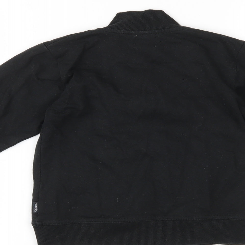 Brand and care label for NAME IT boys’ black full zip jumper, size 5, years