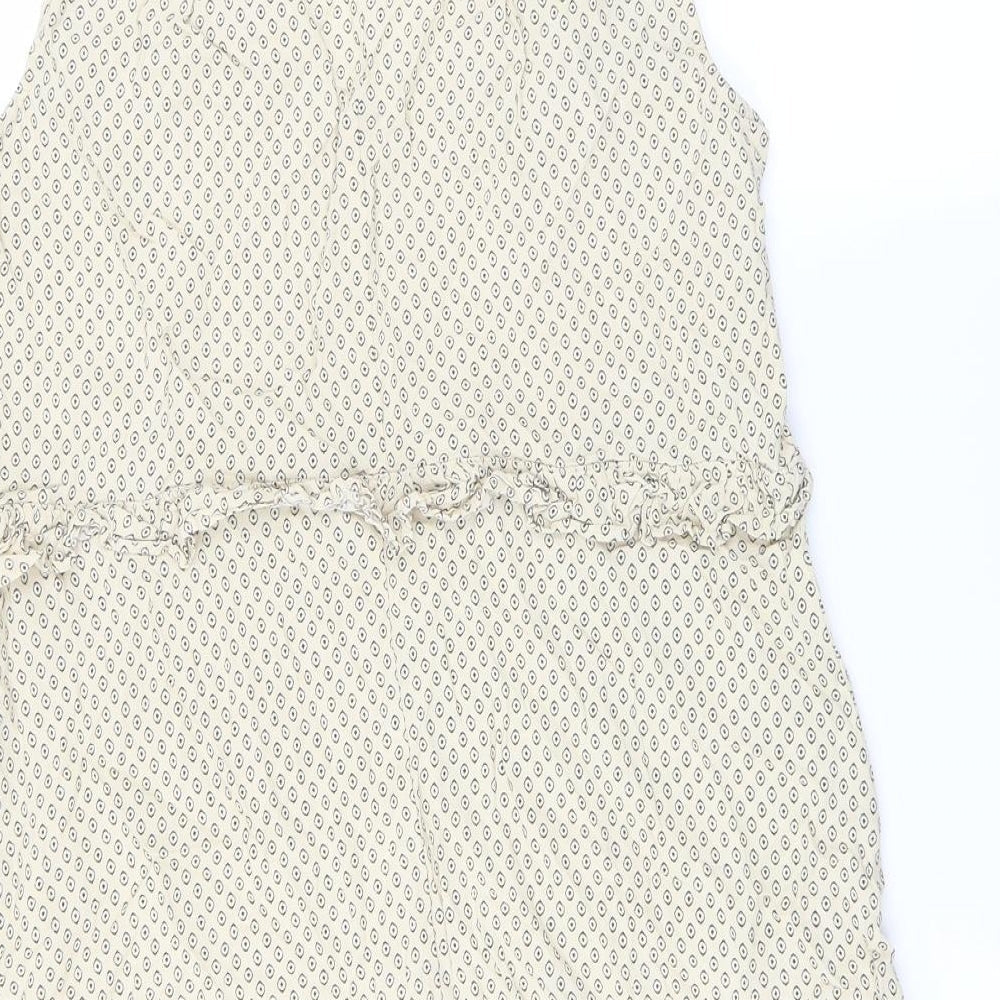 Brand and care label for H&M women’s beige geometric mini, size UK 12