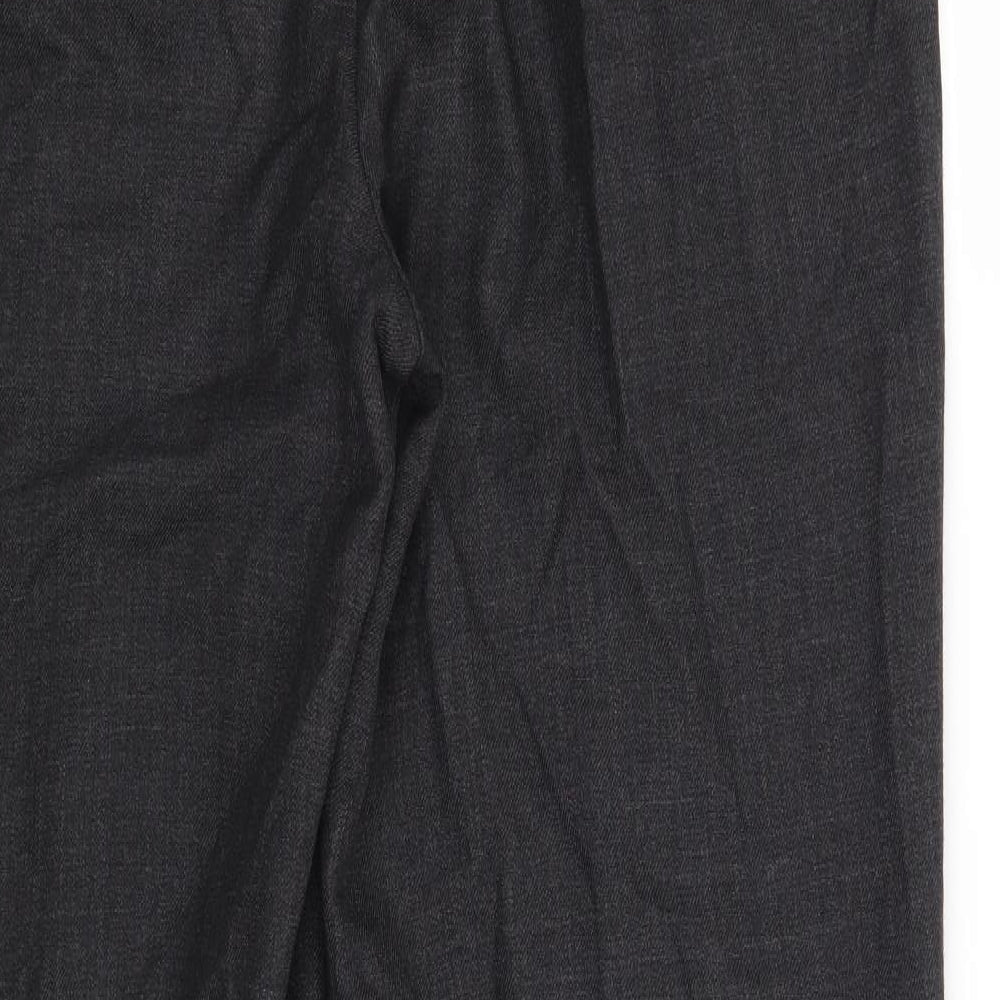 Brand and care label for Skopes men’s green trousers, size 34, in, 30-inch leg