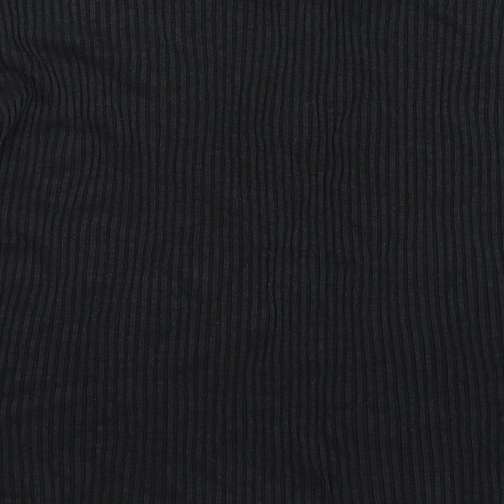Brand and care label for Carolyn Taylor women’s black jumper, size L