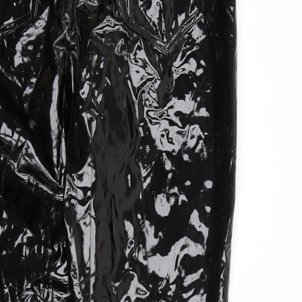 Brand and care label for Missguided women’s black trousers, size UK 10, 27-inch leg