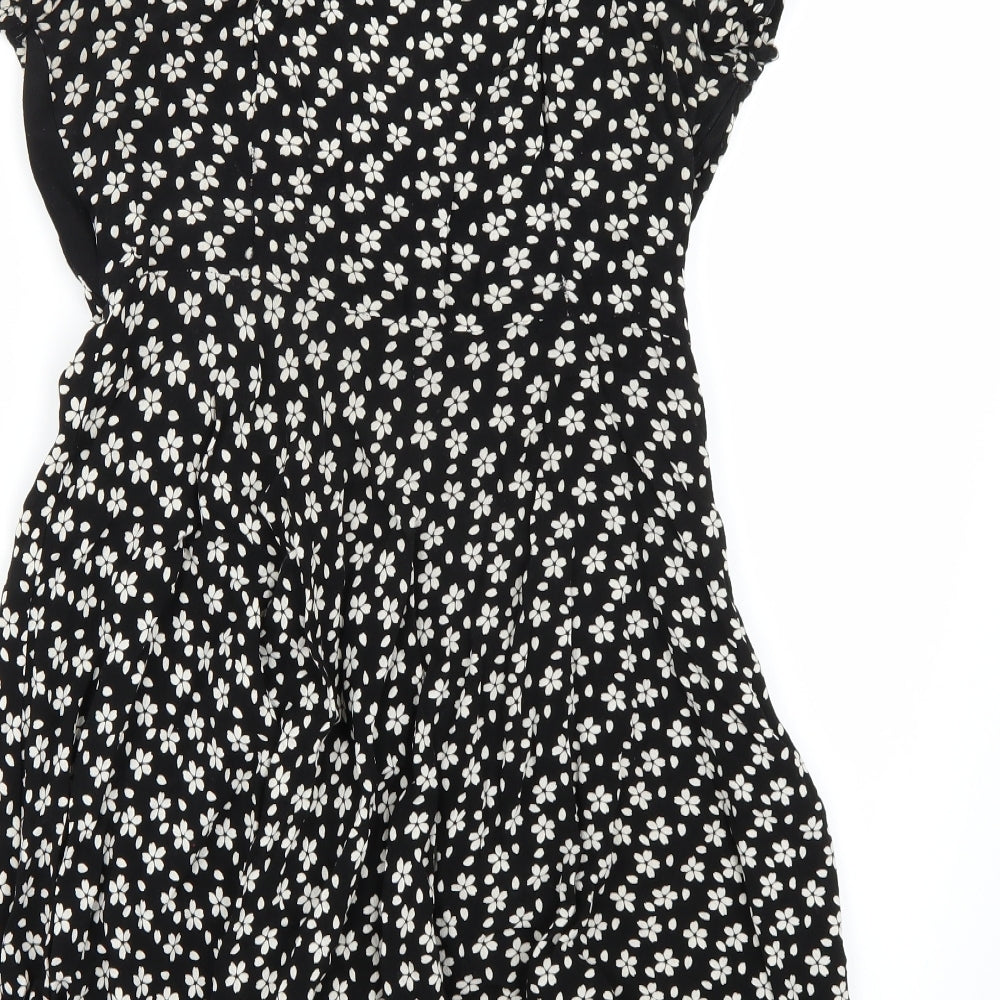 Brand and care label for Cooperative women’s black a-line, size S