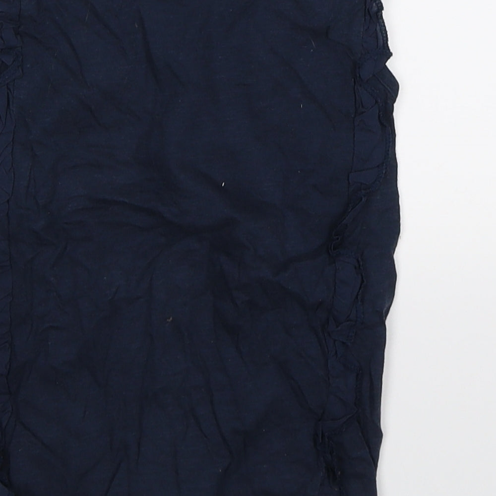 Brand and care label for Next girls’ blue tunic tank, size 7, years