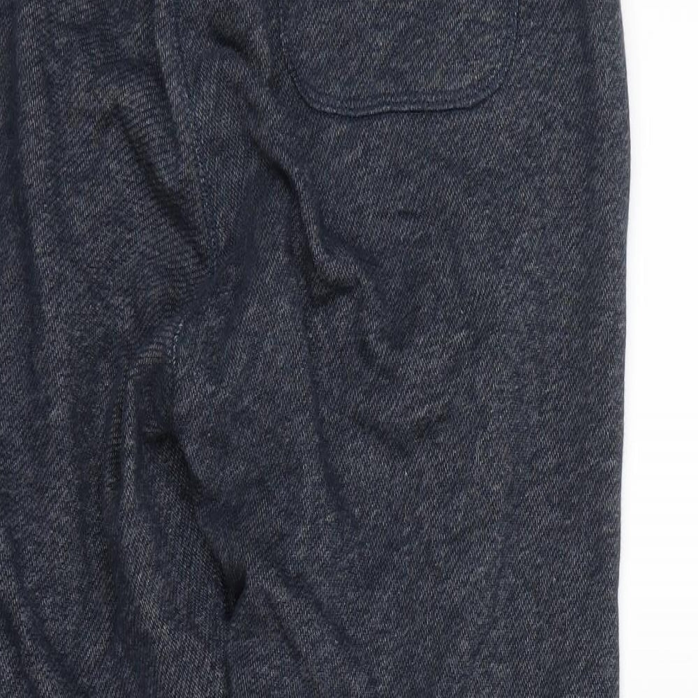 Brand and care label for Marks & Spencer women’s blue jegging trousers, size M, 29.5-inch leg