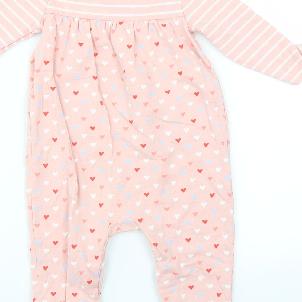 Brand and care label for Gap Baby Pink Babygrow One-Piece, size 6-9, Months - heart pattern