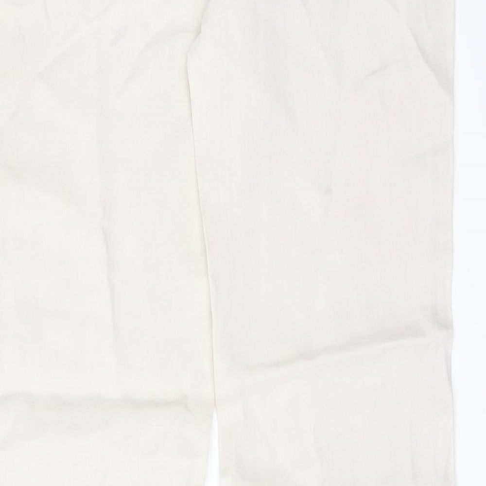 Brand and care label for RESERVED women’s beige trousers, size UK 36, 31-inch leg