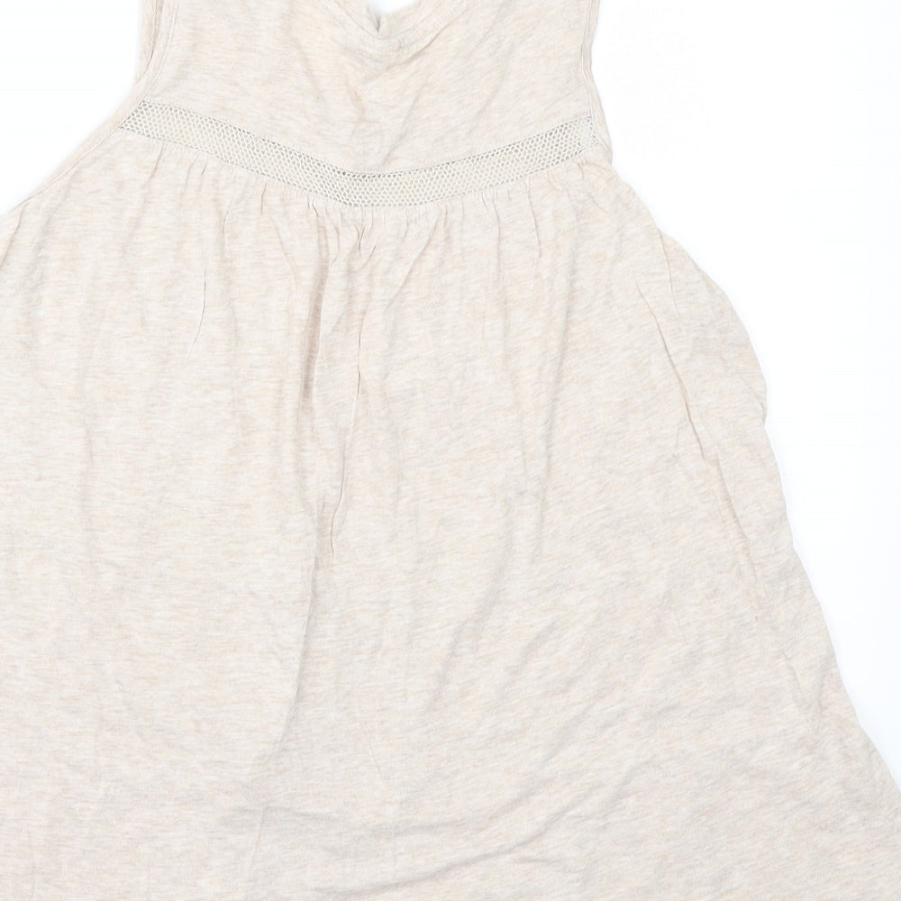 Brand and care label for Gap women’s beige camisole t-shirt, size S