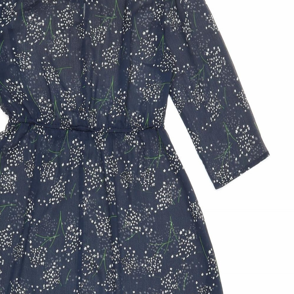 Brand and care label for women’s blue floral fit & flare, size UK 8