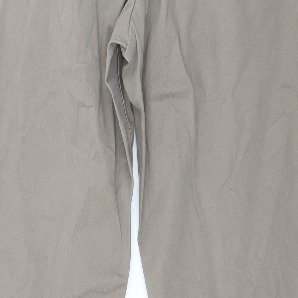 Brand and care label for French Connection women’s brown trousers, size UK 34, in, 31-inch leg