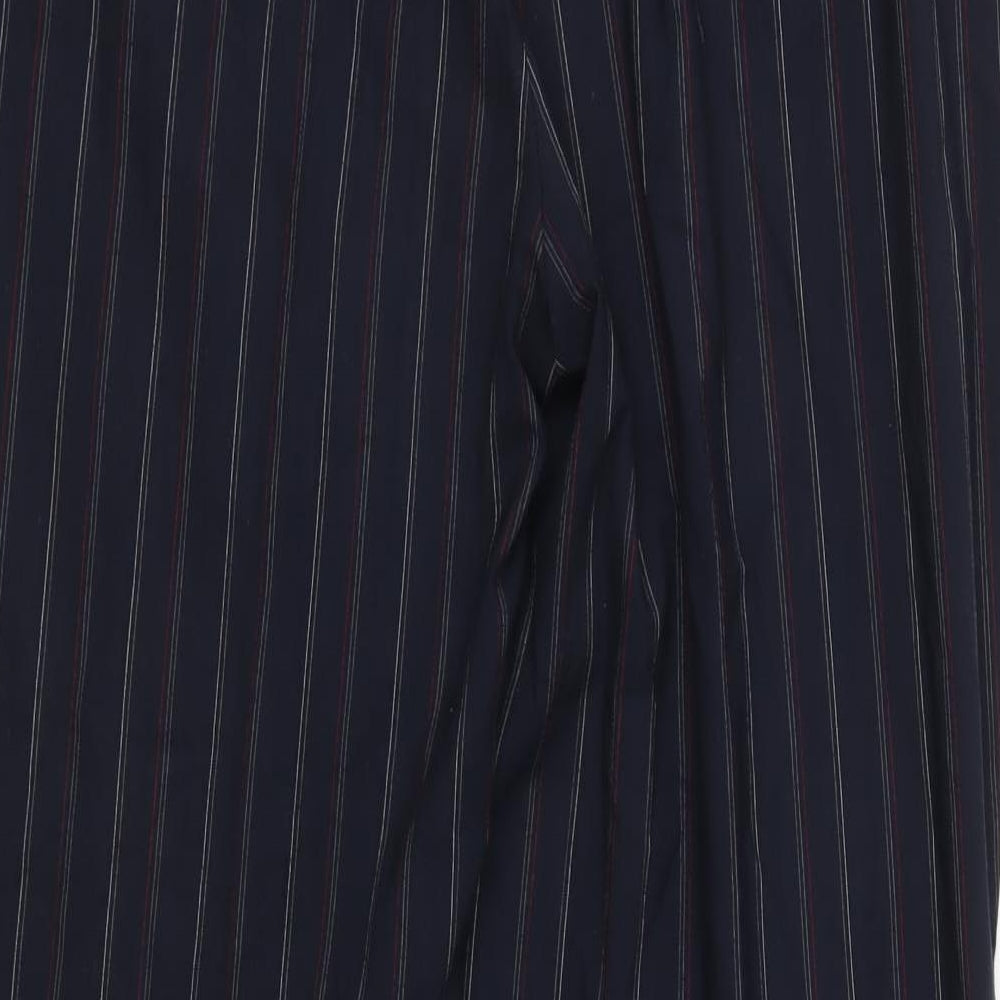 Brand and care label for Toni Dress women’s blue striped trousers, size UK 20, in, 29-inch leg