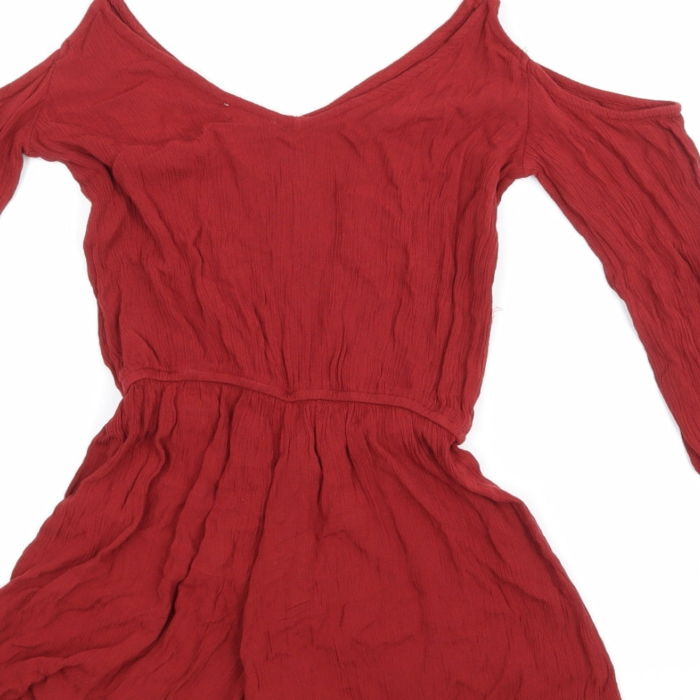 Brand and care label for Wet Seal women’s red playsuit one-piece, size XS