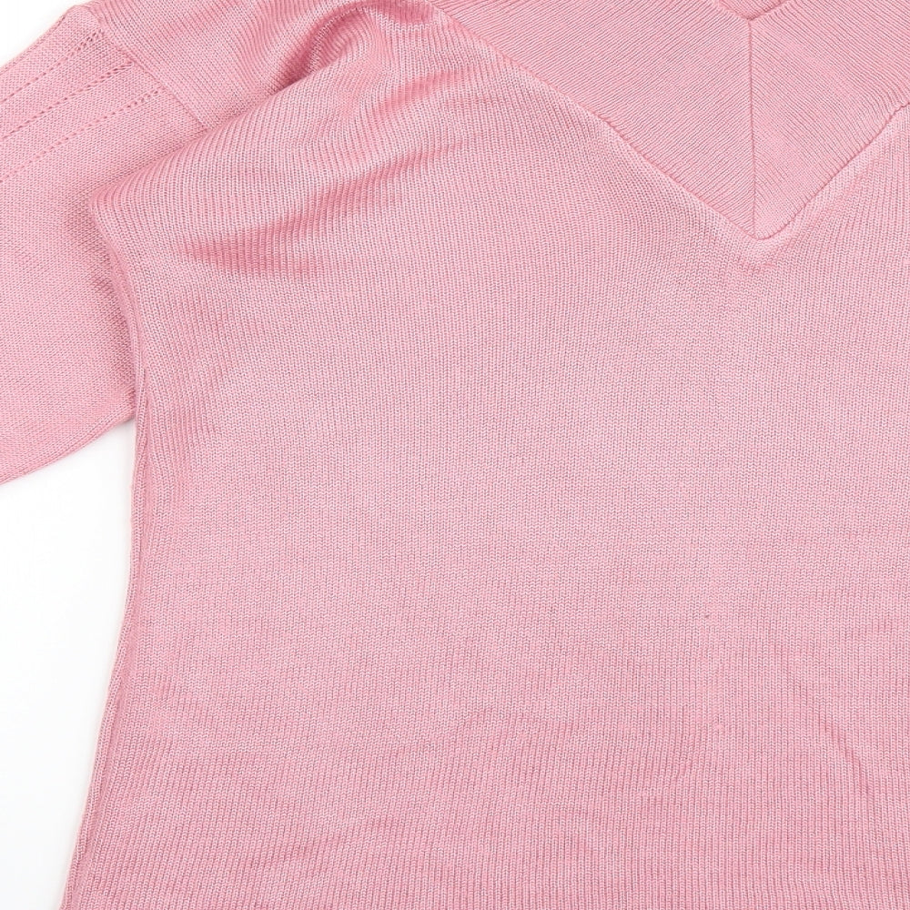 Brand and care label for Imagination women’s pink jumper, size S