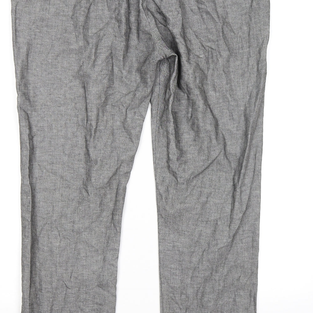 Brand and care label for Marks & Spencer women’s grey trousers, size UK 16, 26-inch leg
