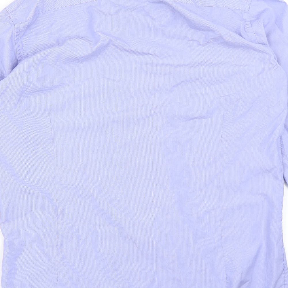 Brand and care label for Francisco Lolli men’s blue dress shirt, size XL