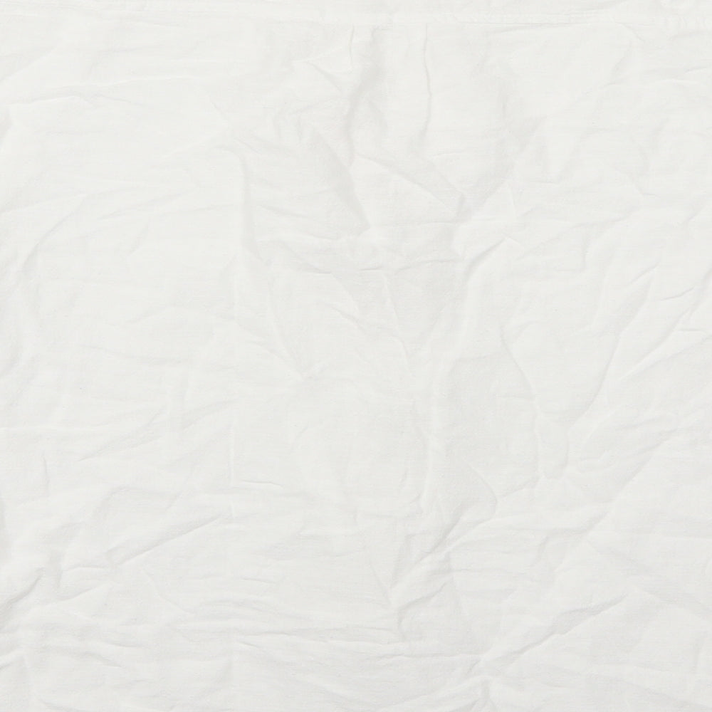 Brand and care label for And Made Collection men’s white button-up, size S
