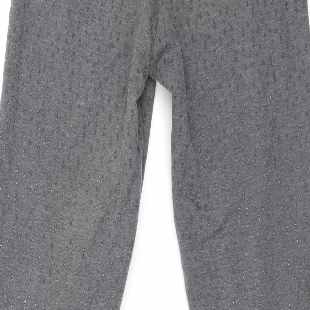 Brand and care label for H&M girls’ grey geometric carrot trousers, size 12-13, years