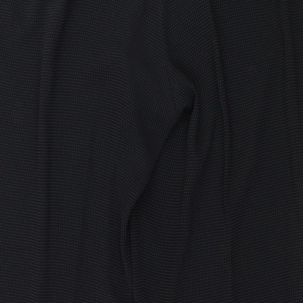 Brand and care label for Amartanto women’s black polka dot trousers, size UK 18, 28-inch leg