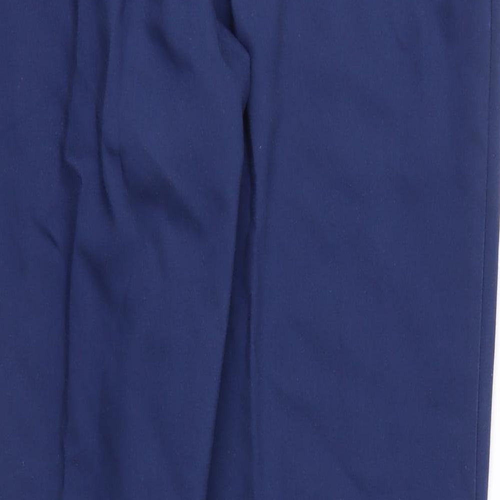 Brand and care label for Country Collection women’s blue trousers, size M, 27-inch leg