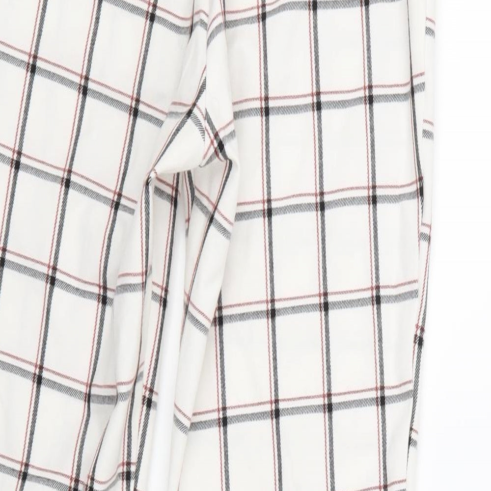Brand and care label for Stradavarius women’s white check sweatpants, size UK 10, 25-inch leg