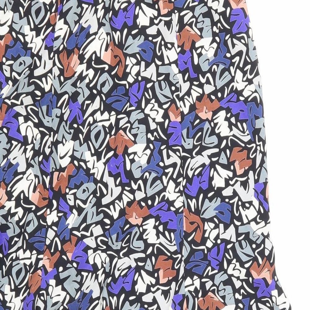 Brand and care label for Preworn women’s multicoloured geometric a-line skirt, size UK 30, in