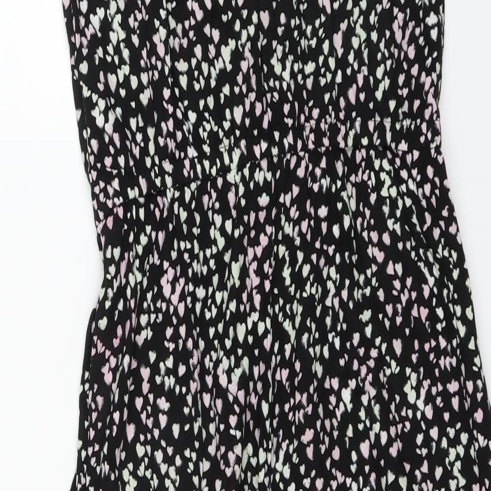 Brand and care label for H&M women’s black floral bodysuit one-piece, size UK 38, 25-inch leg