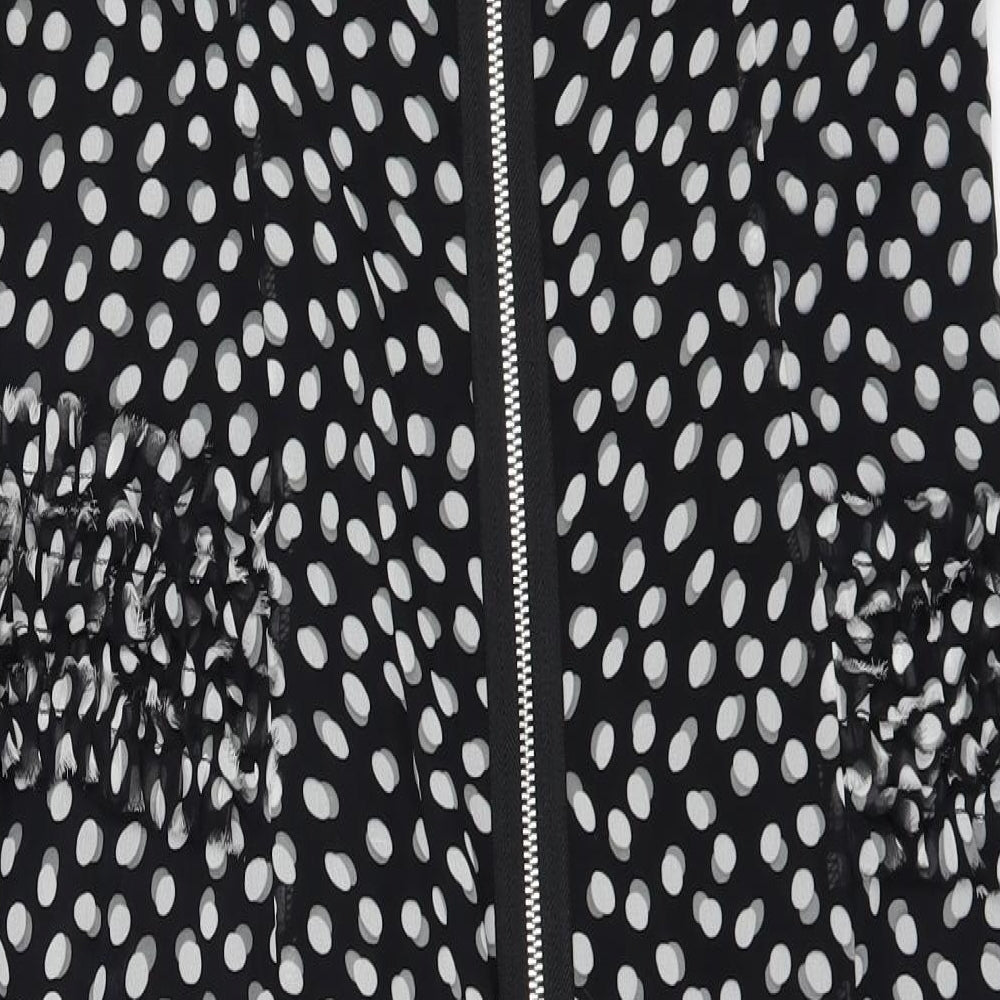 Brand and care label for PROJECT women’s black polka dot a-line, size UK 14