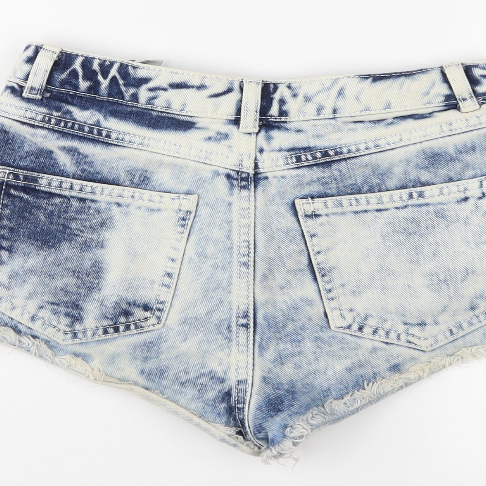 Brand and care label for Topshop women’s blue cut-off shorts, size UK 6