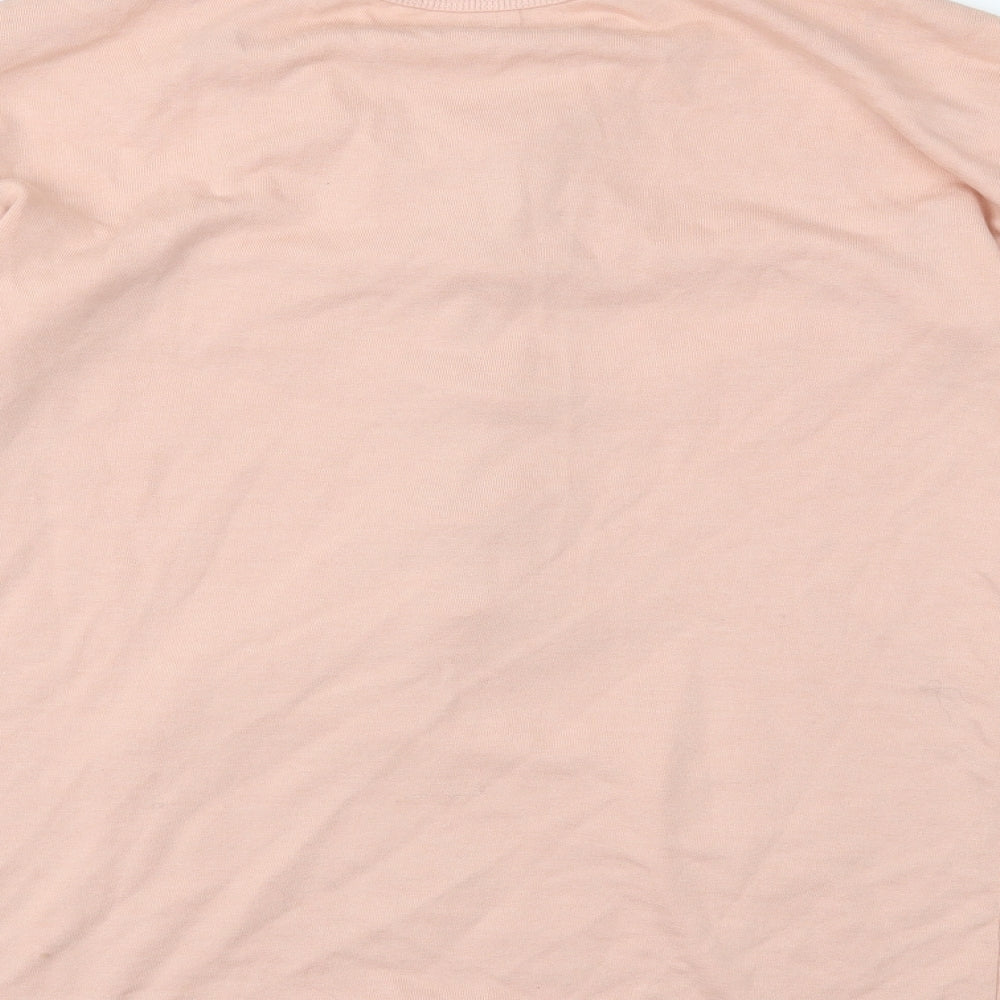Brand and care label for Missguided women’s pink jumper, size UK 6