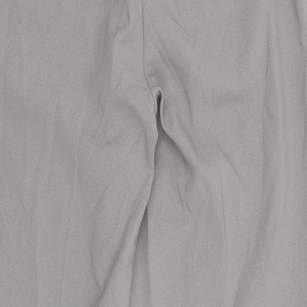 Brand and care label for Marks & Spencer women’s grey trousers, size UK 10, 29-inch leg