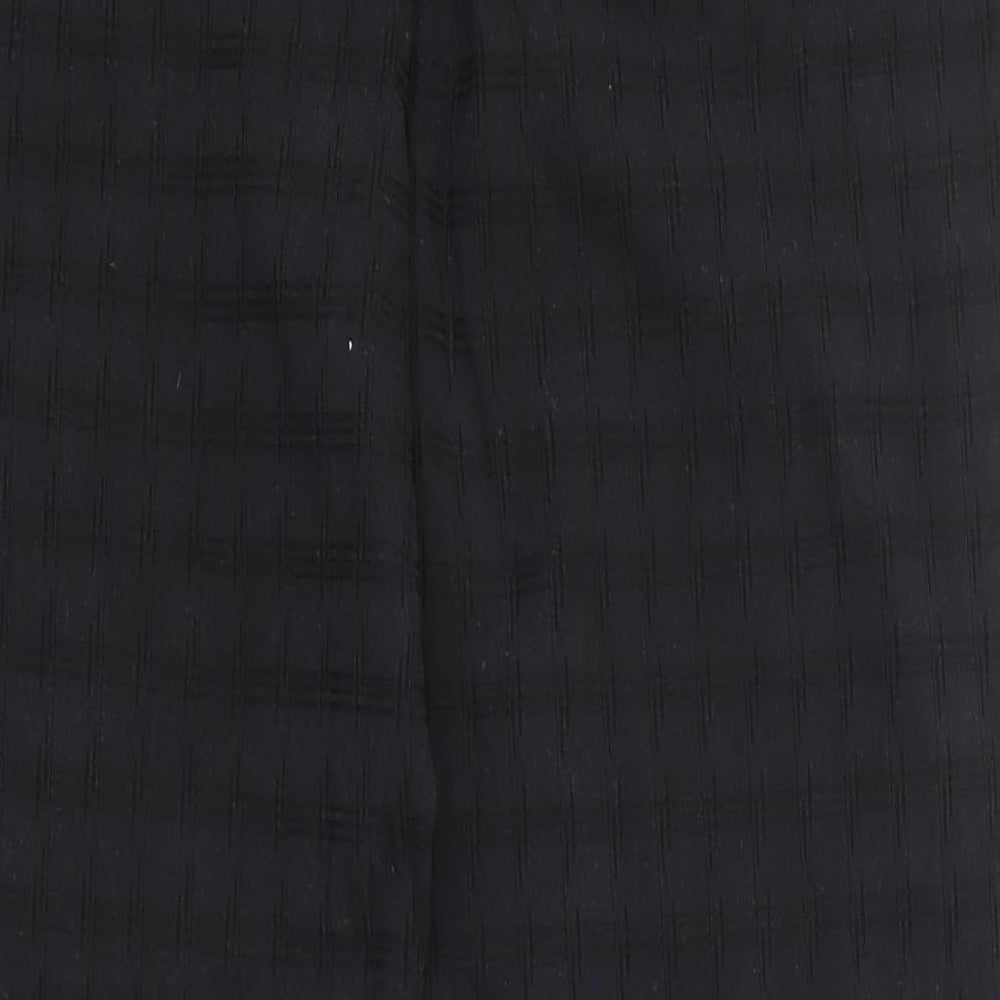 Brand and care label for Gordon Smith women’s black trousers, size UK 16, 30-inch leg