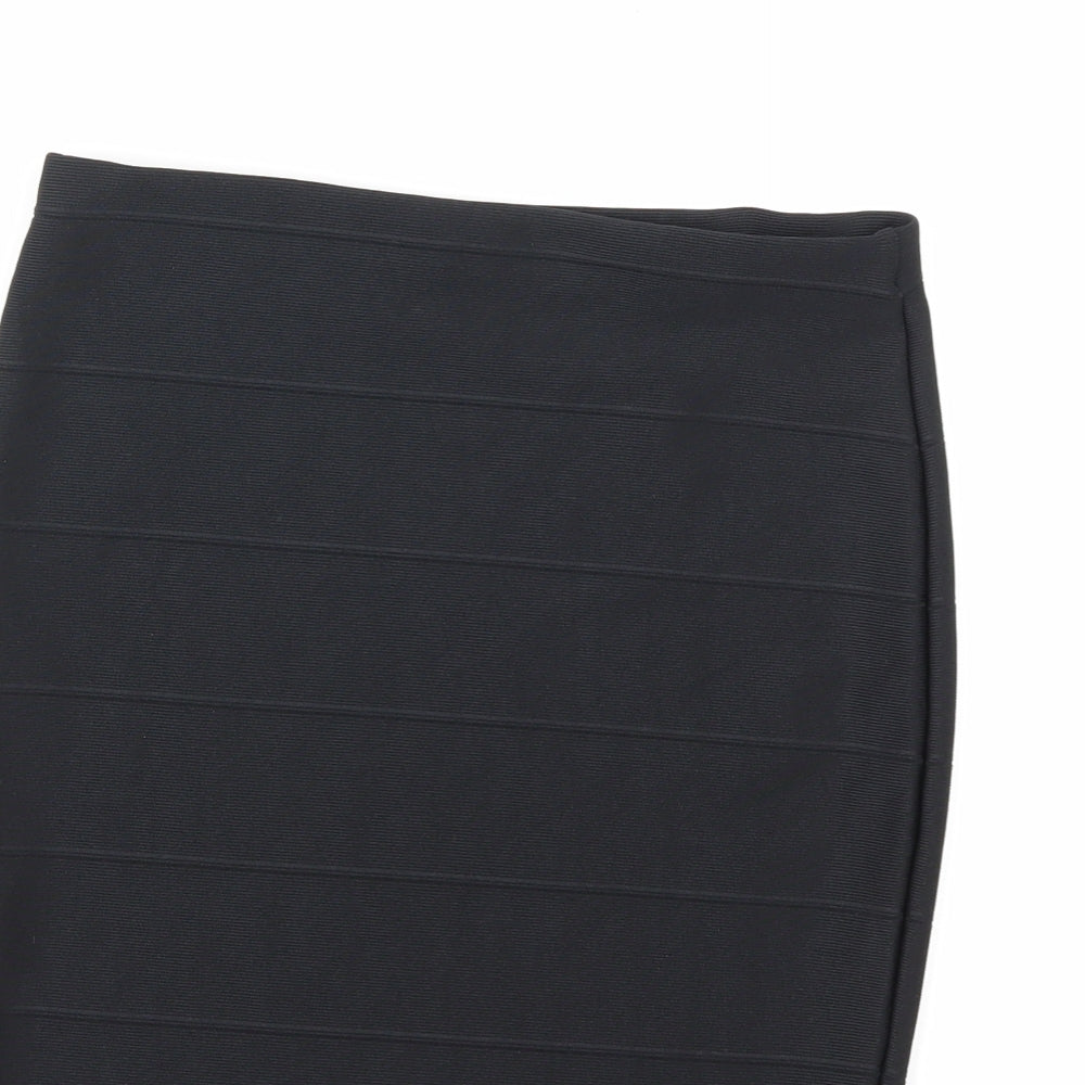 Brand and care label for Missguided women’s black mini skirt, size UK 10