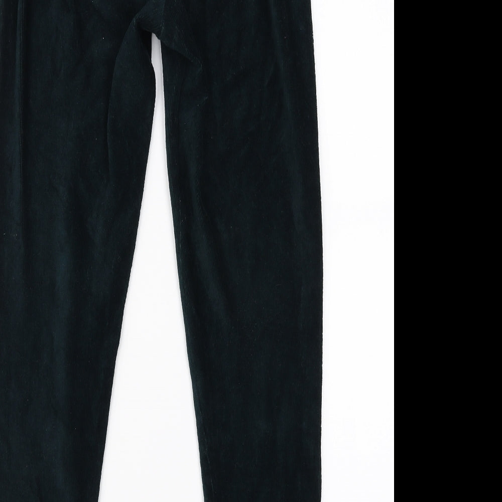 Brand and care label for Marks & Spencer women’s green trousers, size UK 14, 27-inch leg