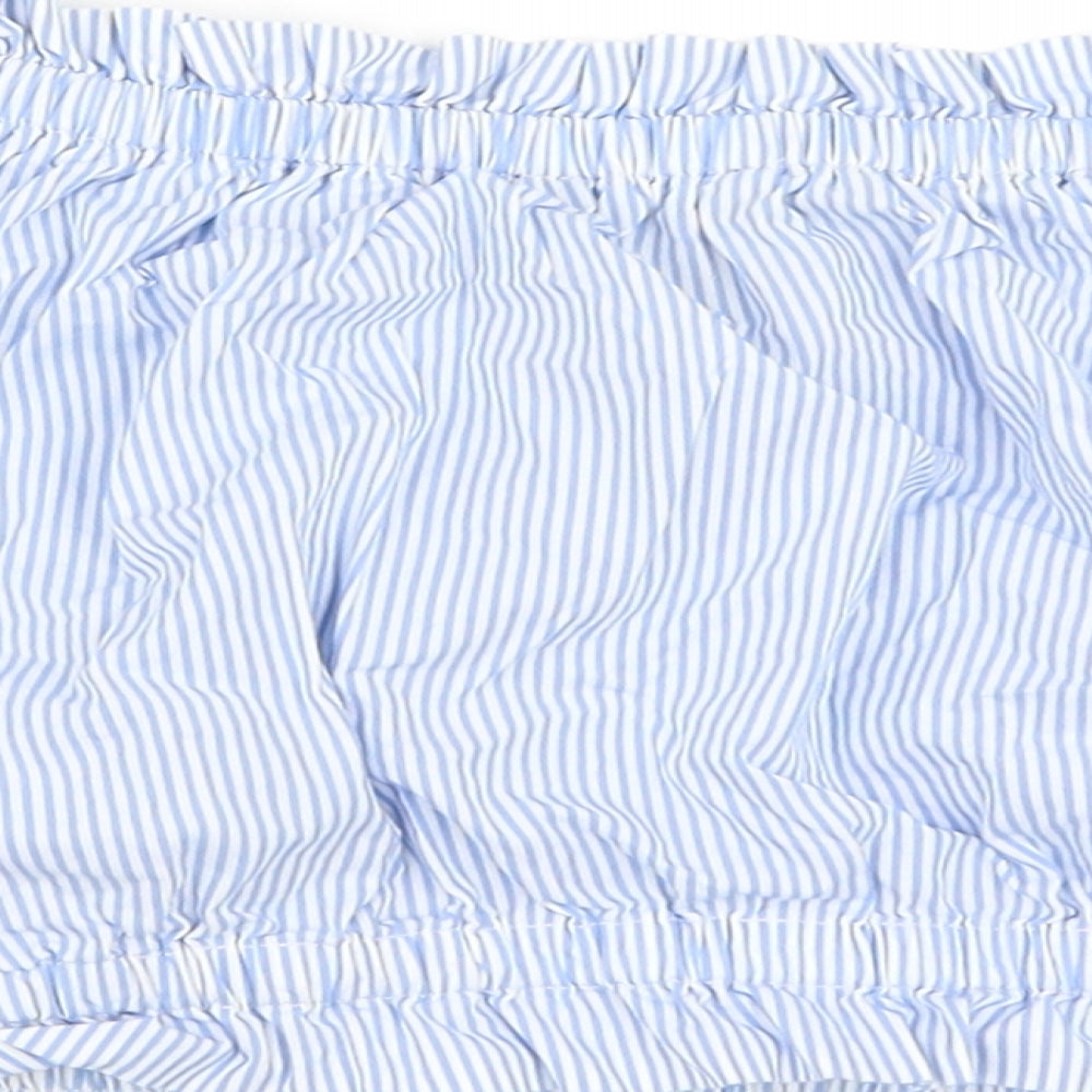 Brand and care label for Forever 21 women’s blue striped cropped blouse, size M