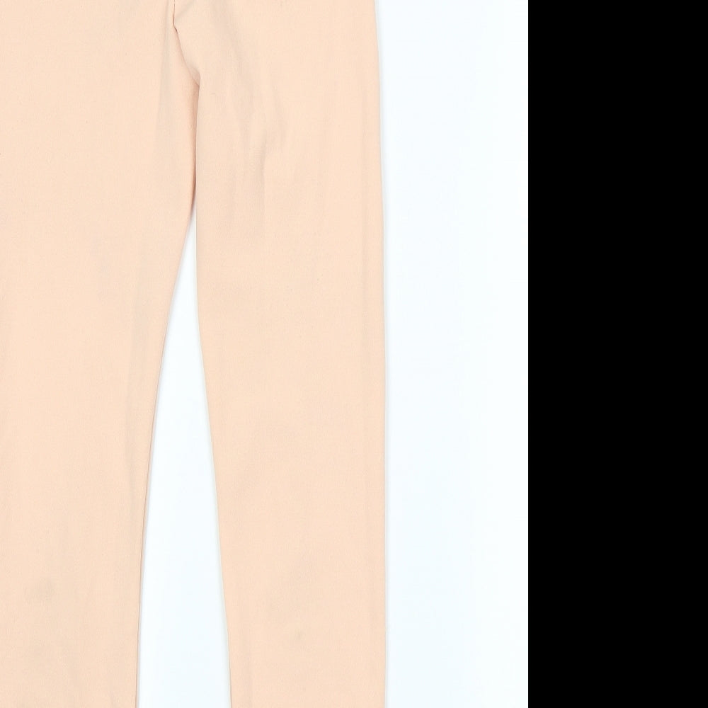 Brand and care label for Preworn women’s pink trousers, size M, 27-inch leg