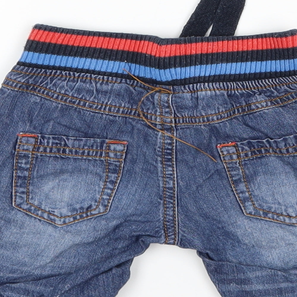 Brand and care label for Boots Mini Club boys’ blue denim cropped jeans, size 6-9, months