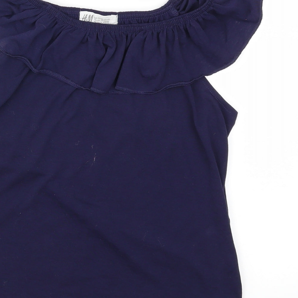 Brand and care label for H&M girls’ blue basic blouse, size 6, years