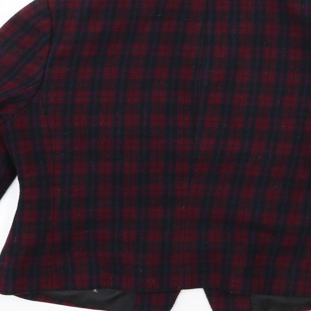 Brand and care label for New Look women’s red striped jacket, size UK 14