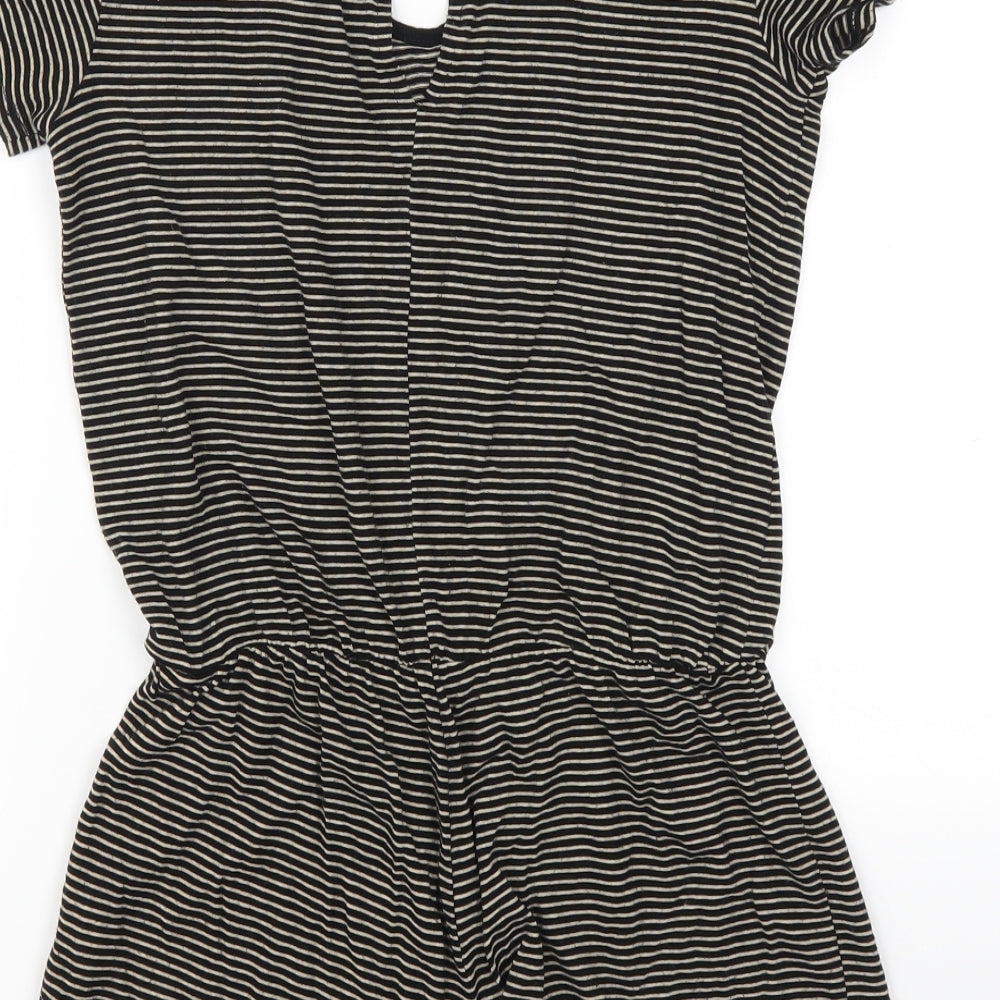 Brand and care label for Forever 21 women’s beige striped rayon playsuit one-piece, size S