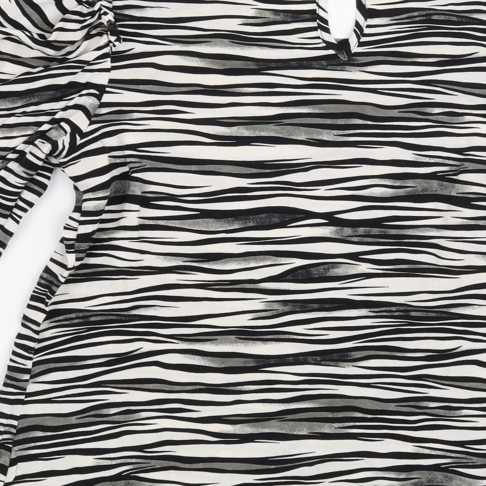 Brand and care label for Papaya women’s white animal print basic blouse, size UK 8