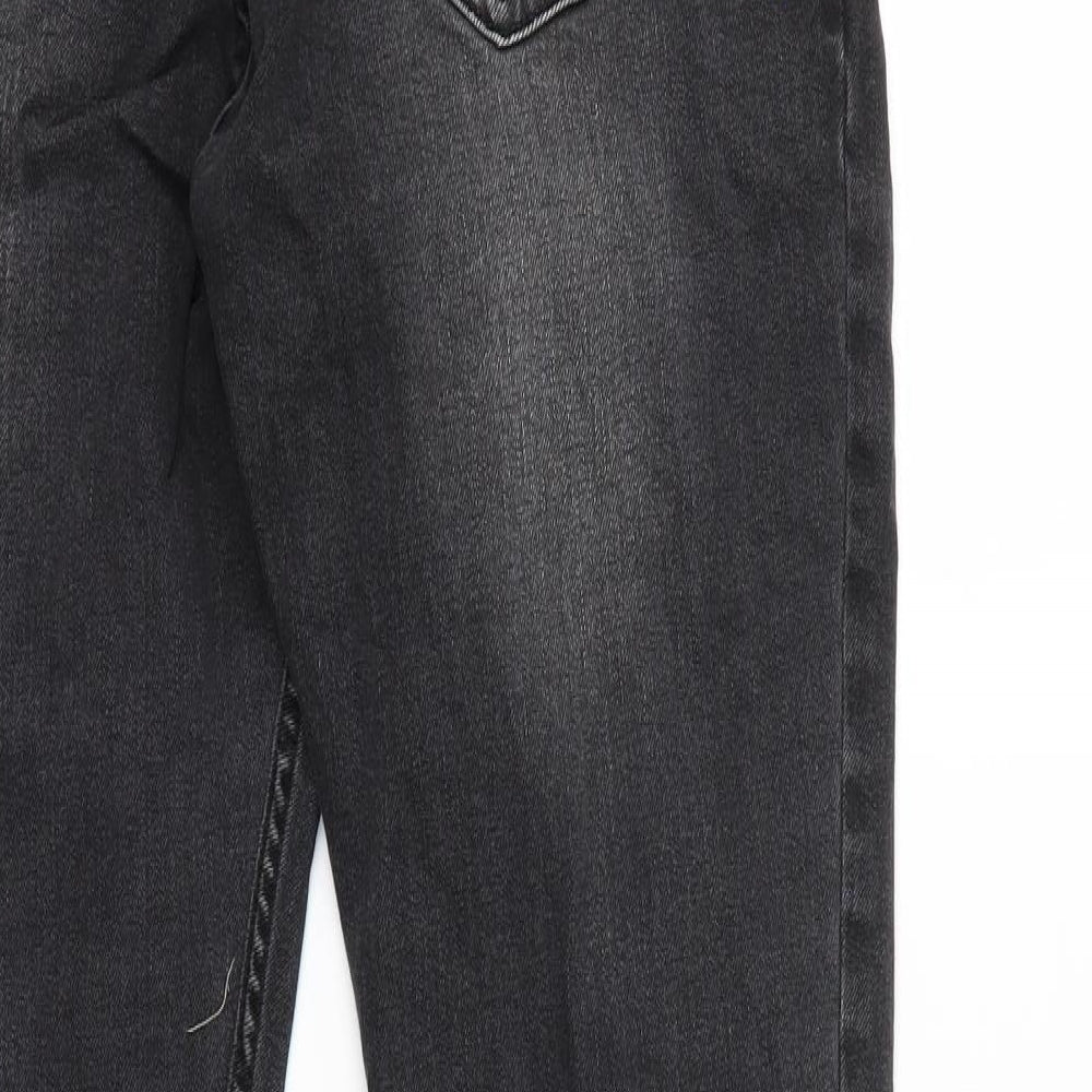 Brand and care label for ROCKER women’s black skinny jeans, size M, 30-inch leg
